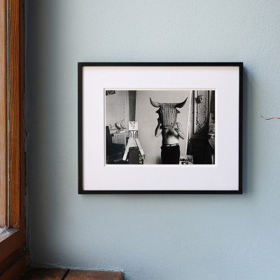 Pablo Picasso with a wicker mask originally intended for bullfighters' training. La Californie, Cannes 1959